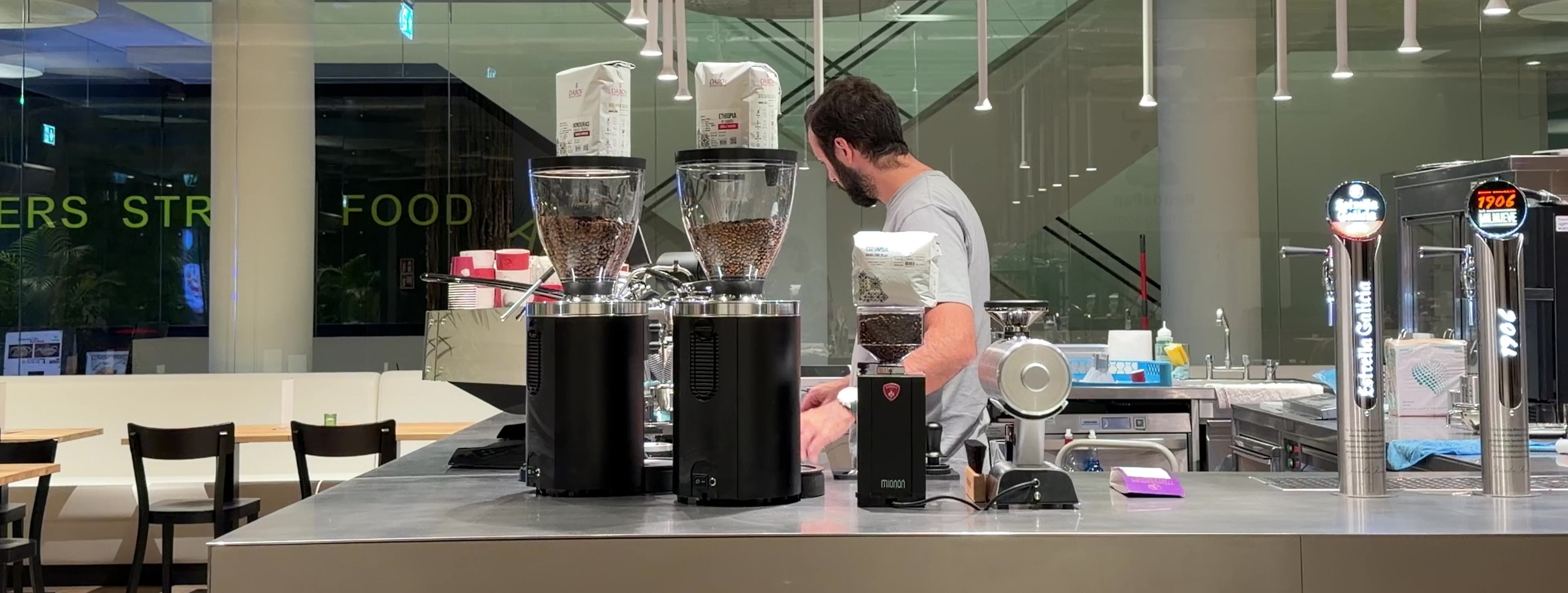 Brü Specialty Coffee — barista preparing specialty coffee drinks